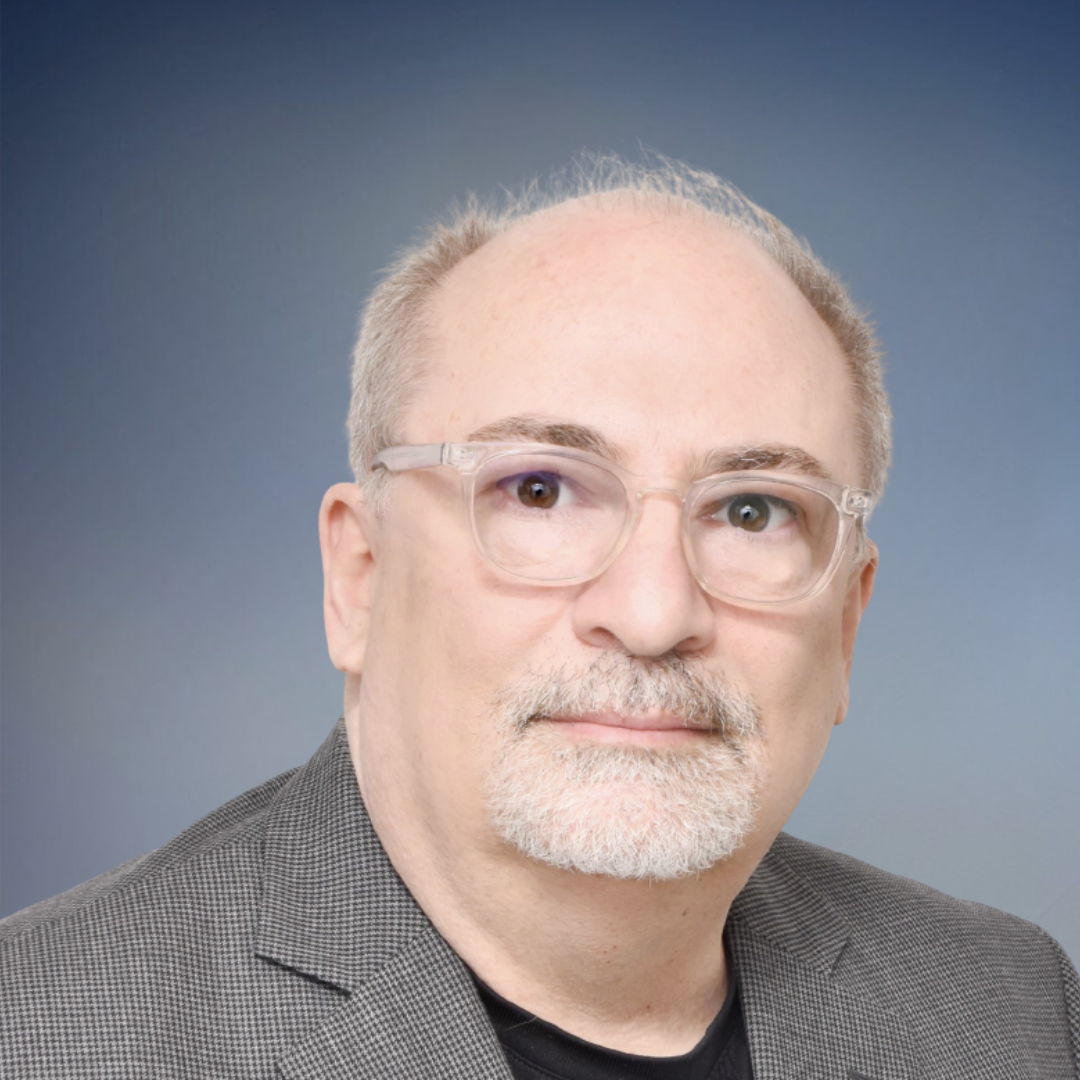 Bob Amato, VP of Investor Relations at Common Walk Realty, wearing glasses and a gray blazer